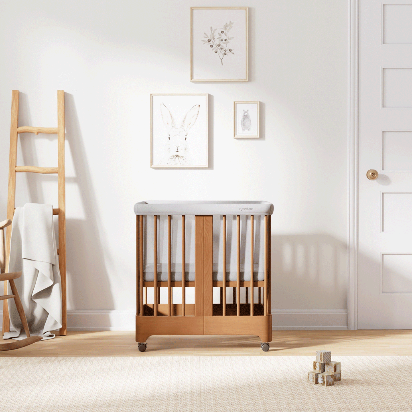 Gif of chestnut color Newton Nest Convertible Crib in all of its different possible conversions, in a beautiful nursery 999-8440-CST-C1