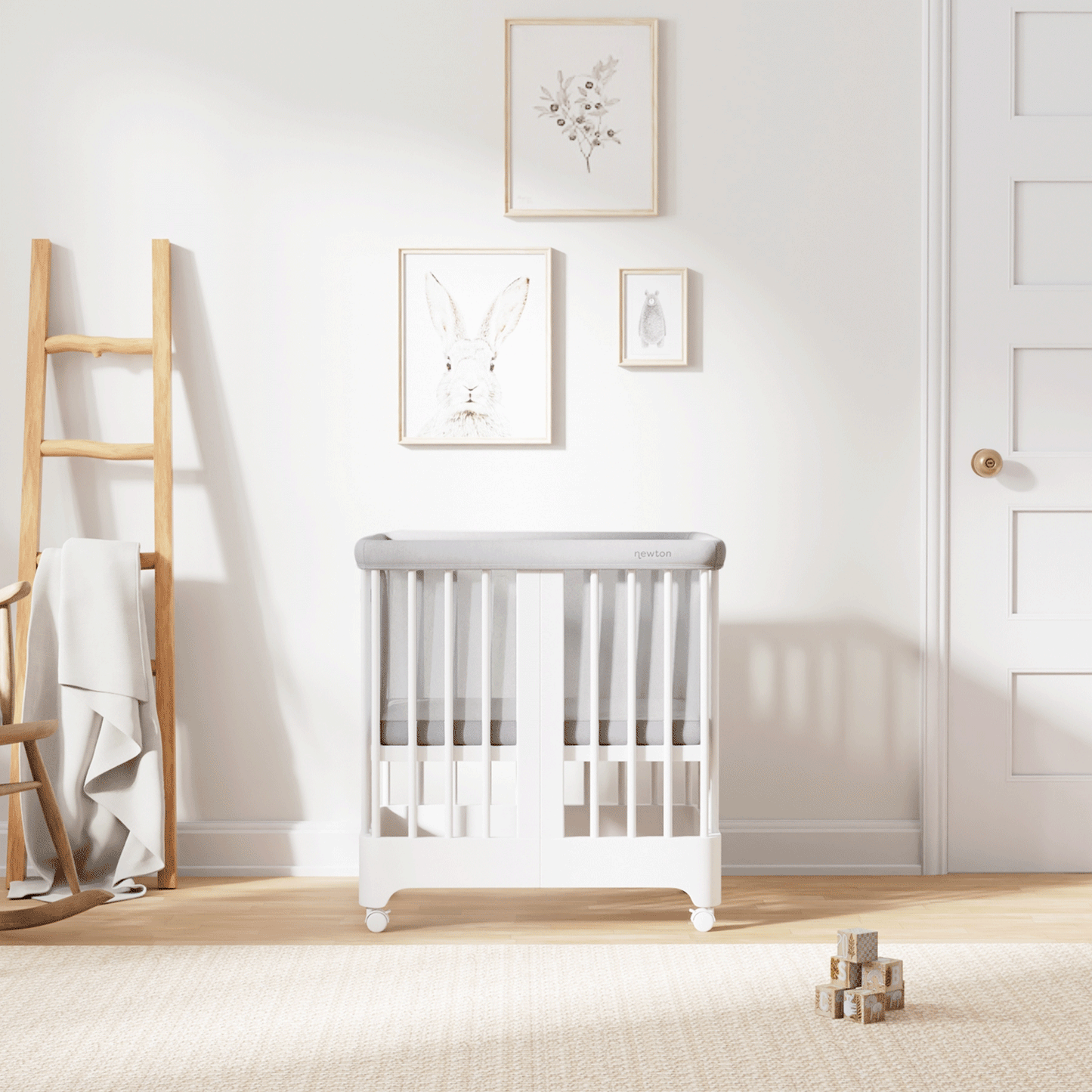 Gif of white color Newton Nest Convertible Crib in all of its different possible conversions, in a beautiful nursery 999-8440-WHT-C1