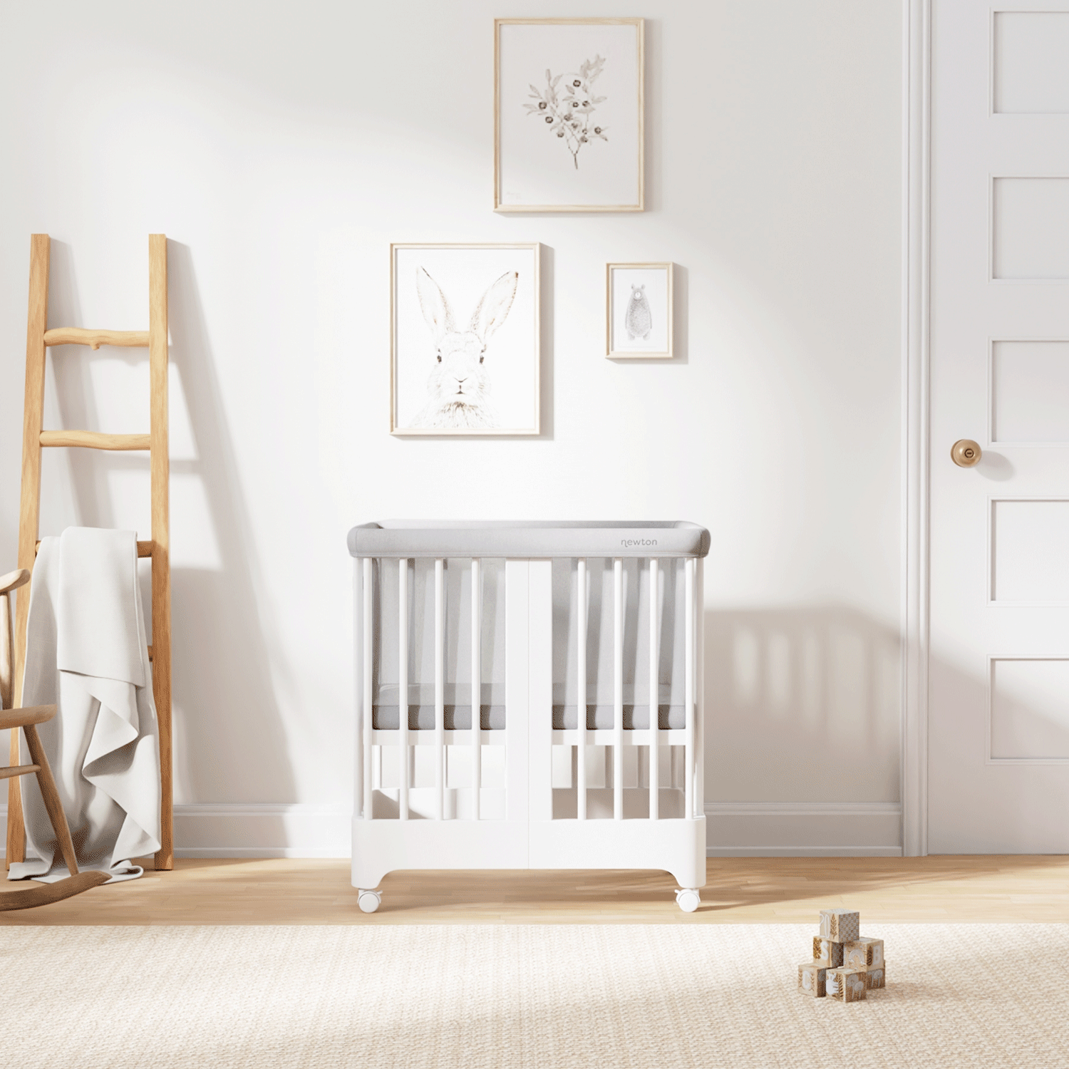 Gif of white color Newton Nest Convertible Crib in all of its different possible conversions, in a beautiful nursery 999-8440-WHT-C1