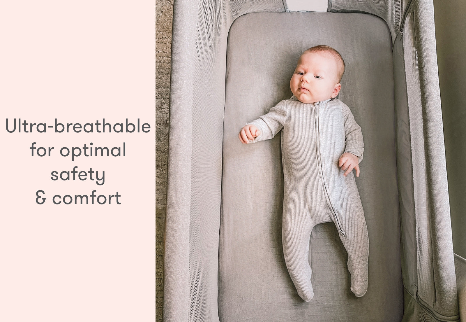 Baby in a gray sleeper lying in a breathable crib, with text "Ultra-breathable for optimal safety & comfort."