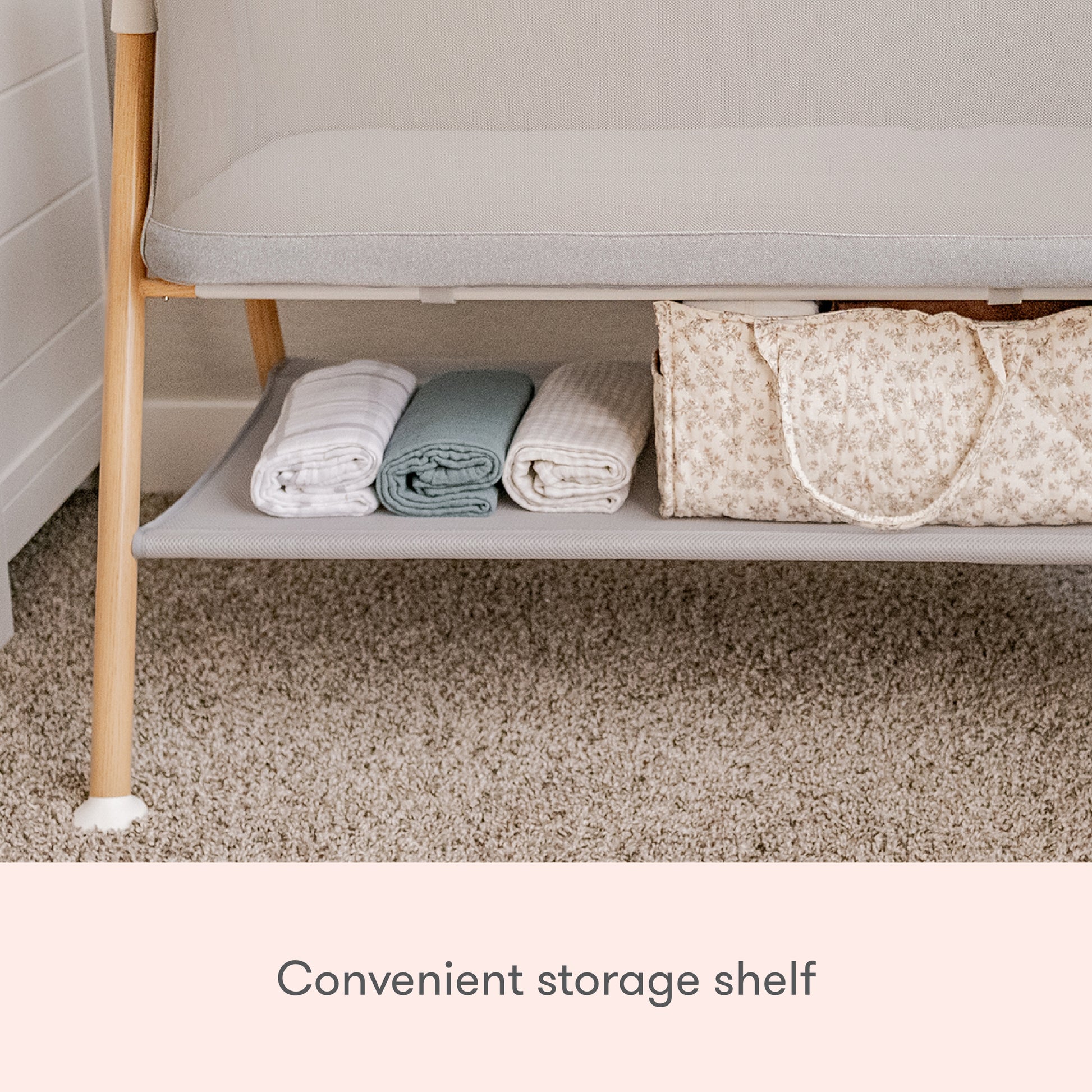 close up shot of essential bassinet storage shelf, text reads "convenient storage shelf."