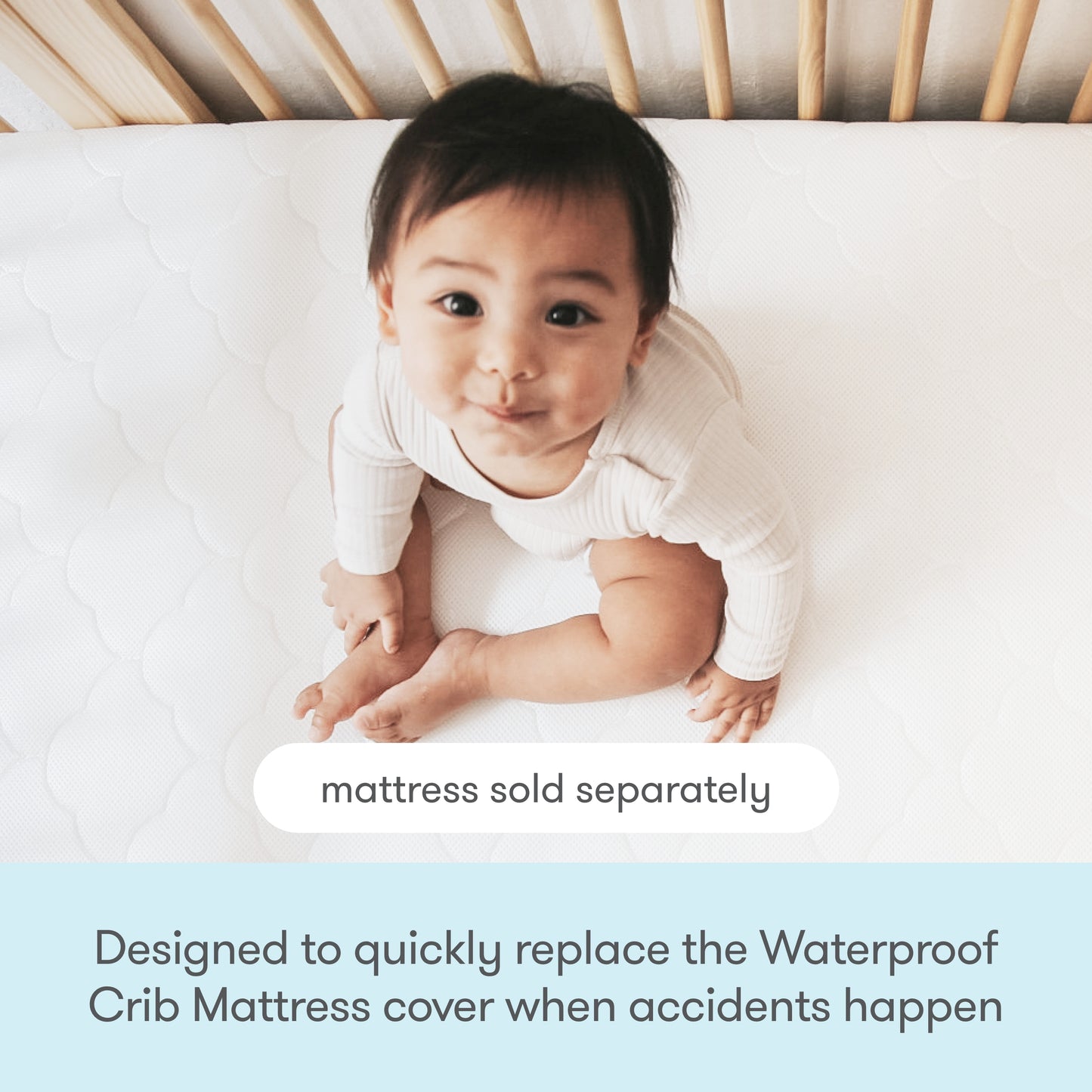 A baby in a white onesie sits on a crib mattress, smiling. Text below: Crib mattress sold separately. The Newton Baby Extra Waterproof Crib Mattress Cover quickly replaces the cover for extra breathability when accidents occur.