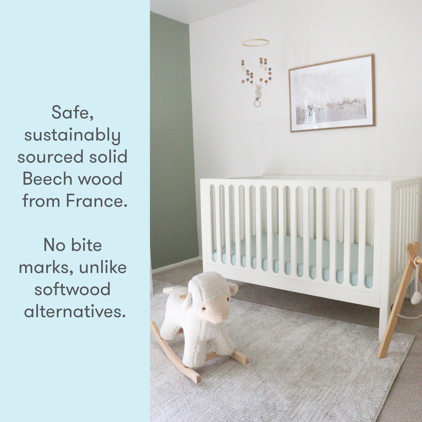 A baby's nursery featuring a white crib made from sustainably sourced solid Beech wood from France, accompanied by a text stating "Safe, sustainably sourced solid Beech wood from France. No bite marks, unlike softwood alternatives," with a toy sheep on a rocking base in the foreground.