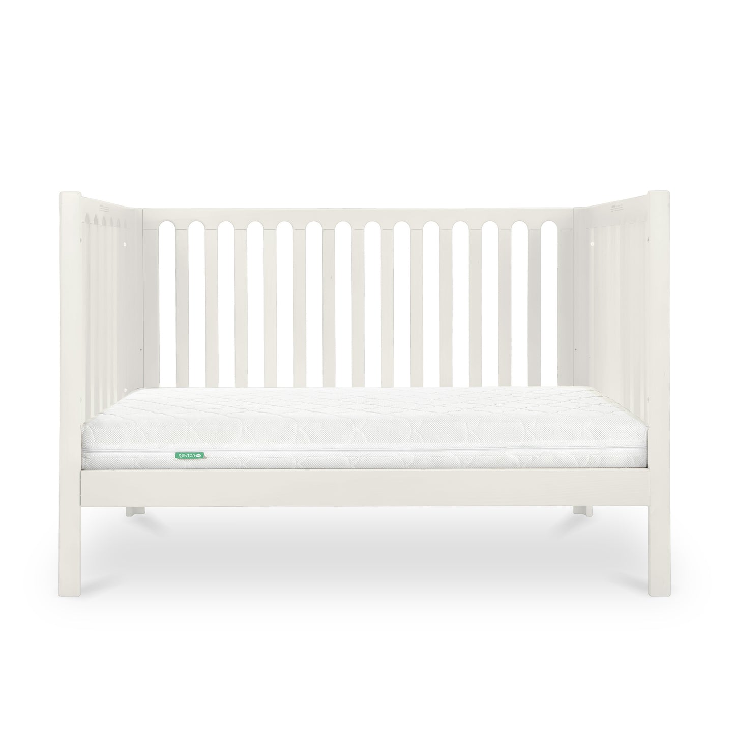 A simple white baby crib with a clean mattress displaying a small green 'Newton' logo on its corner.