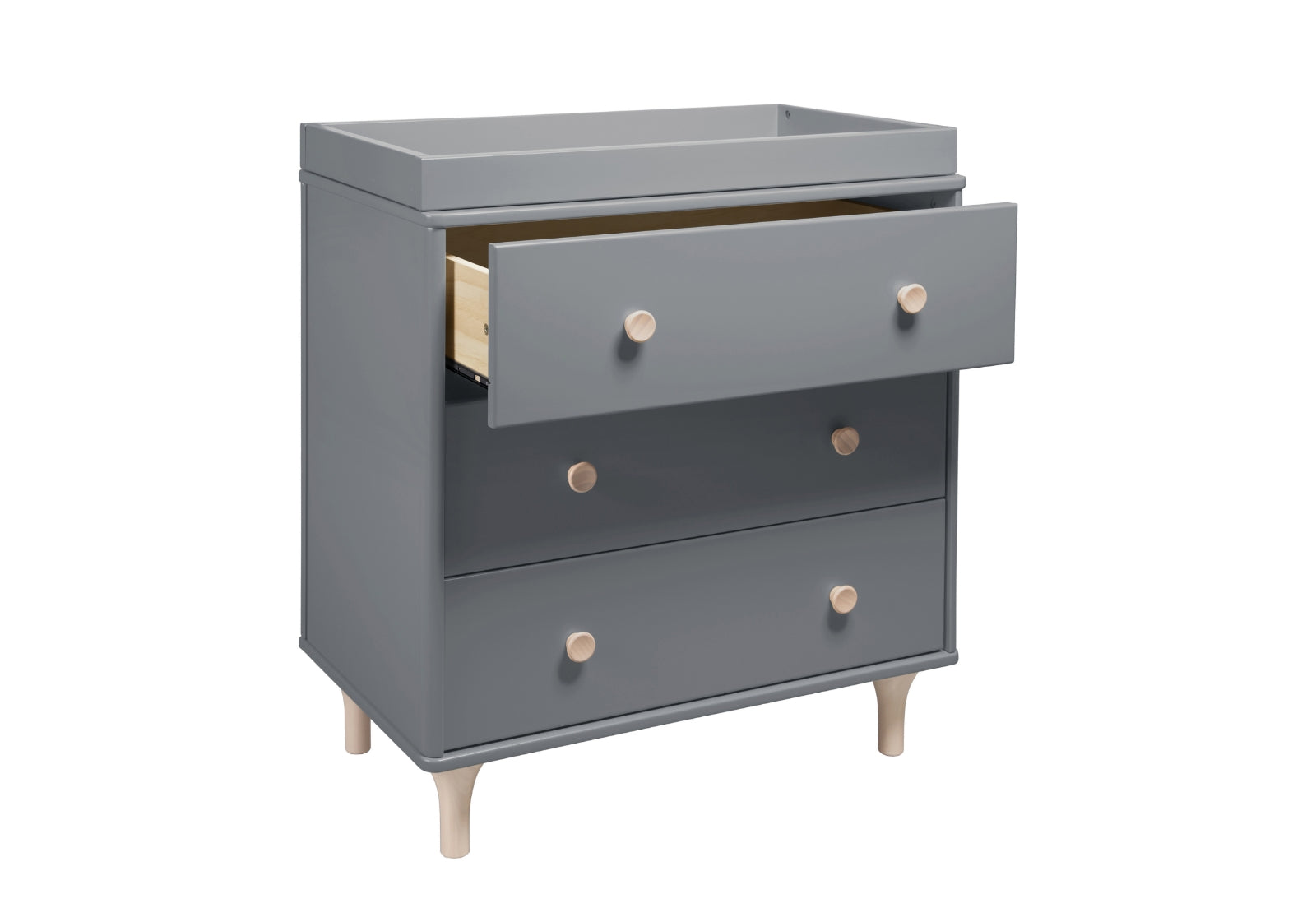 Gray nursery changing table with three drawers and wooden knobs, partially open top drawer showing interior.