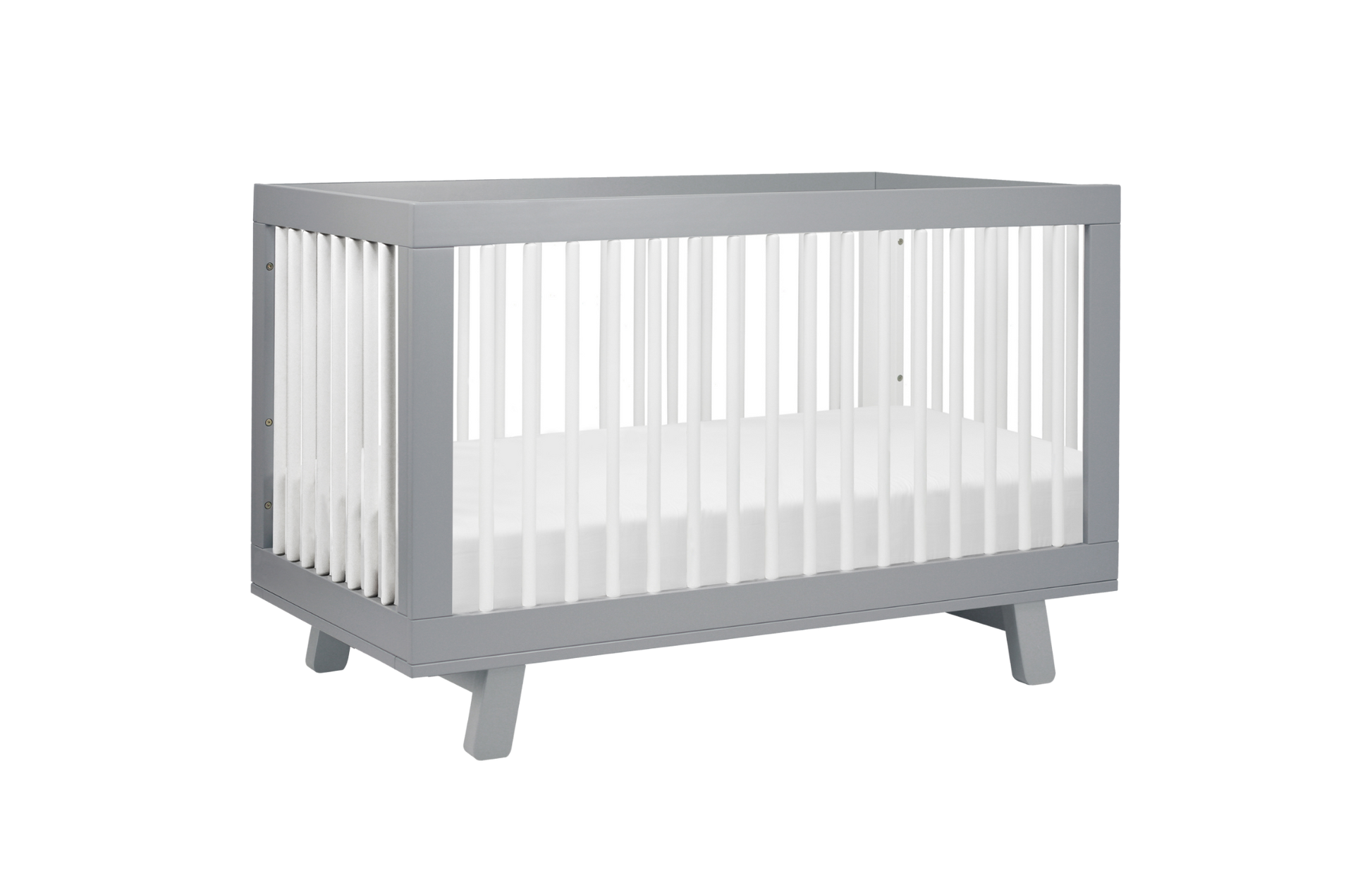 The Babyletto Hudson Convertible Crib features a gray frame, white slatted sides, included crib mattress, and four angled legs, shown against a plain white background.