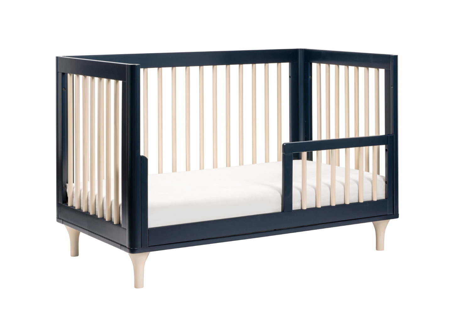 Modern black and white baby crib with vertical slats on a white background.