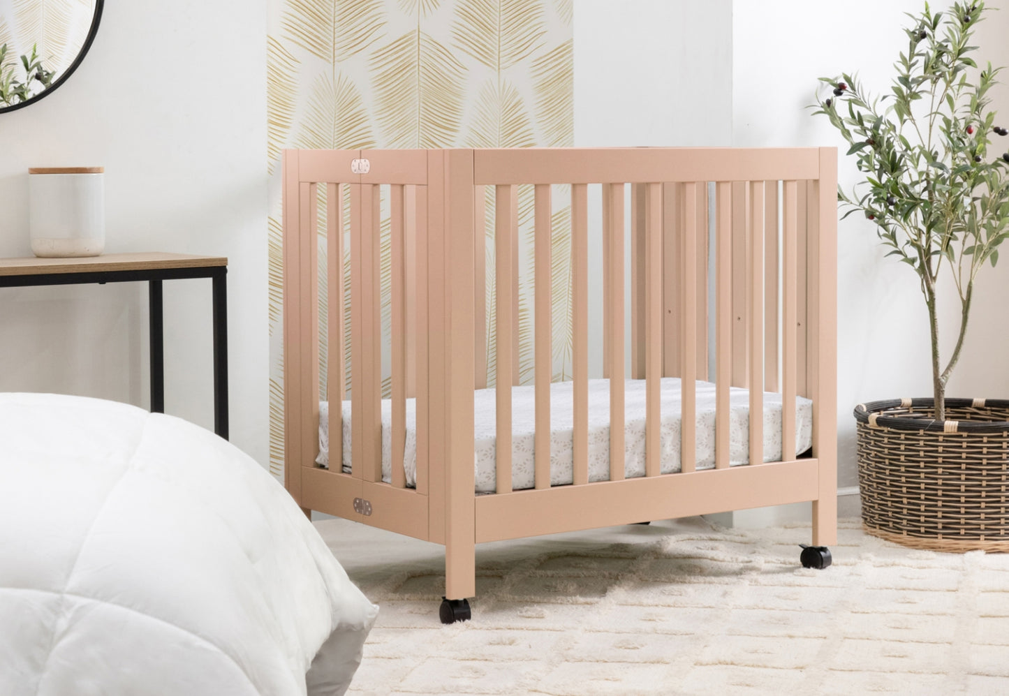 A modern wooden crib in a serene nursery setting, complemented by neutral decor and natural light.