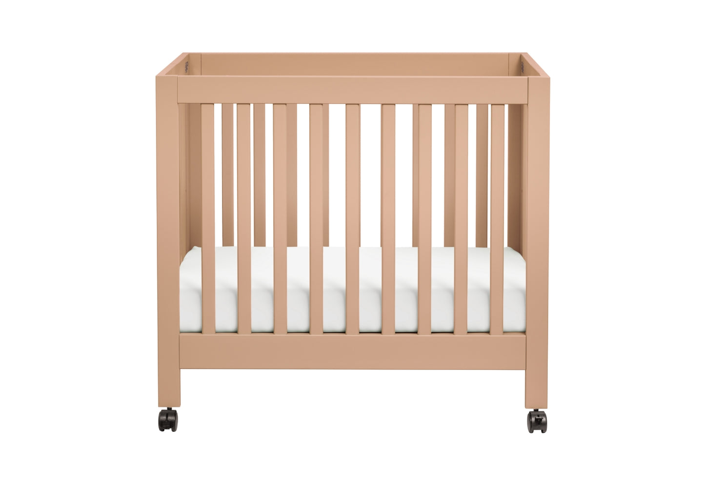 Modern beige baby crib on wheels with white bedding, set on a plain white background.
