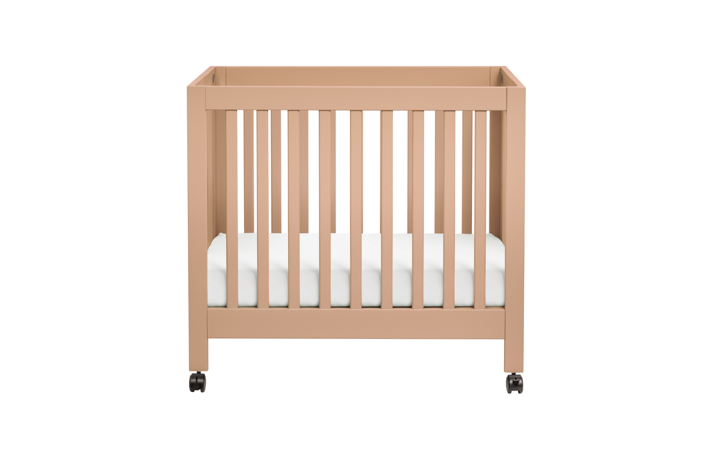 The Babyletto Origami Mini Crib, shown in light brown with vertical slats, a white mattress, and four small wheels, makes an ideal portable mini crib for small spaces—displayed against a plain white background.