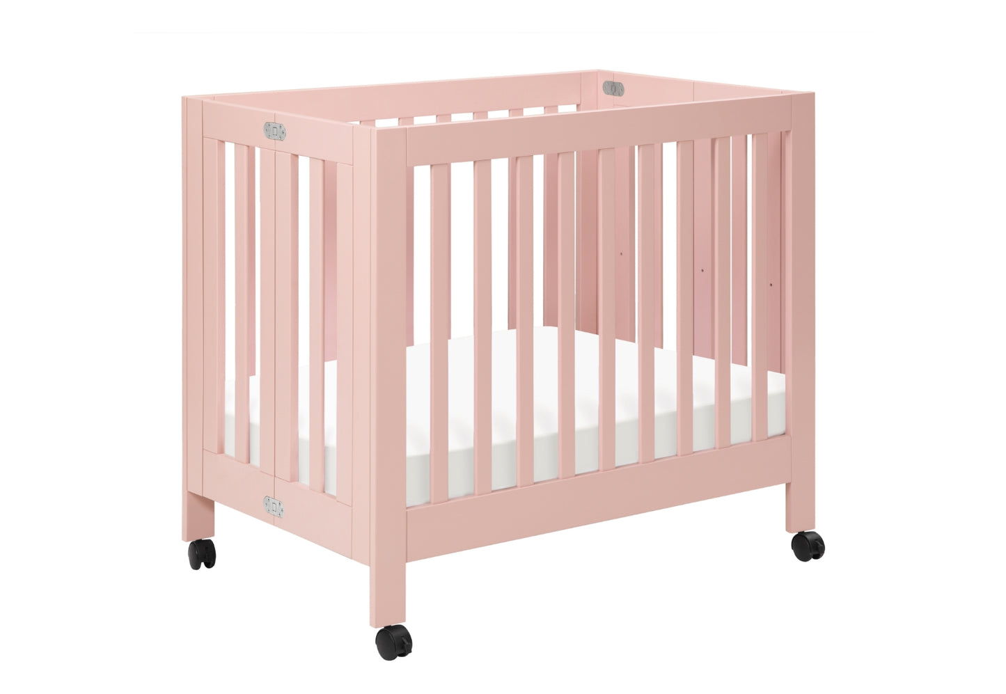 Pink baby crib on wheels with visible Newton Baby logo on one side, showcasing a modern and safe design for infants.
