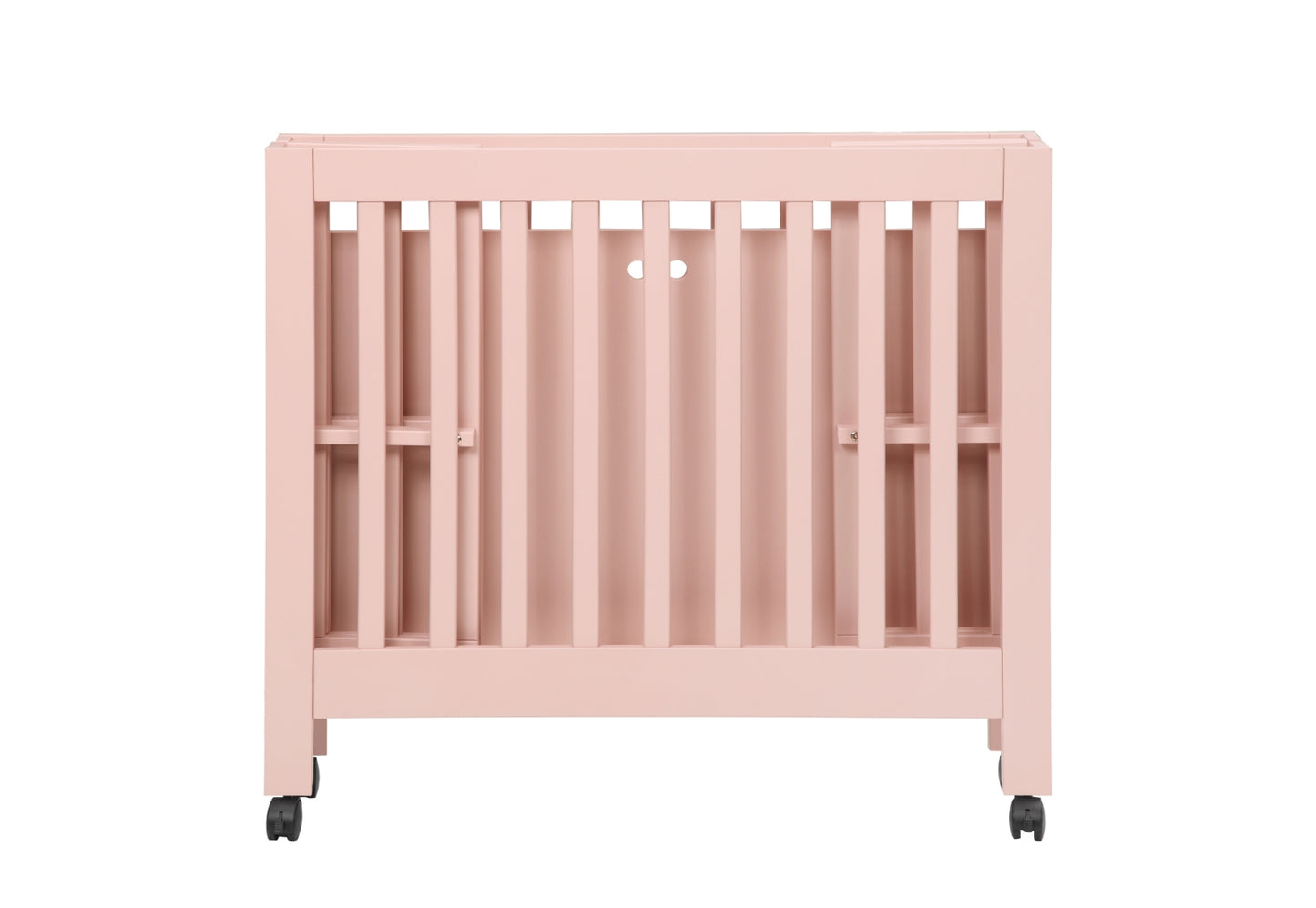 Pink baby crib on wheels isolated on a white background.