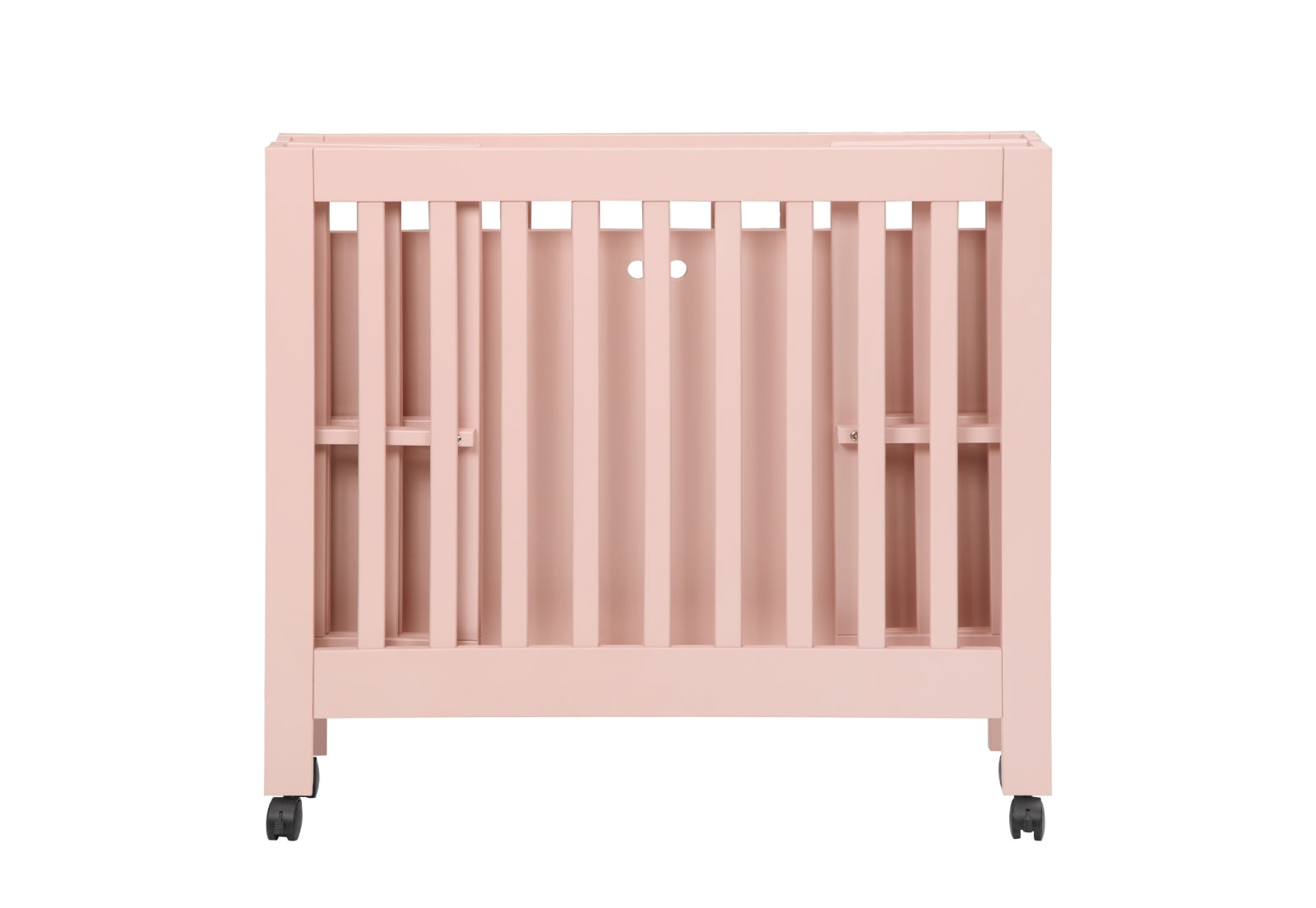 Pink baby crib on wheels isolated on a white background.