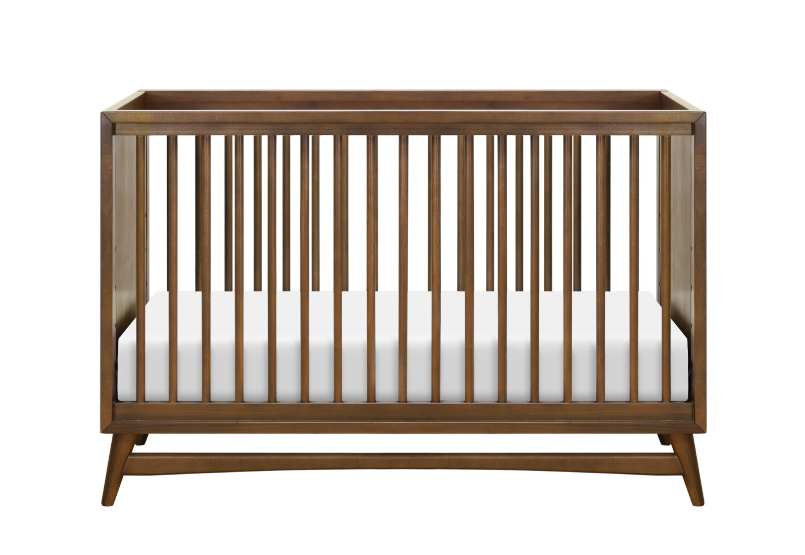 The Babyletto Peggy Convertible Crib features a mid-century design with vertical wooden slats and comes with a white mattress, shown from the front against a plain white background—ideal for any modern nursery.