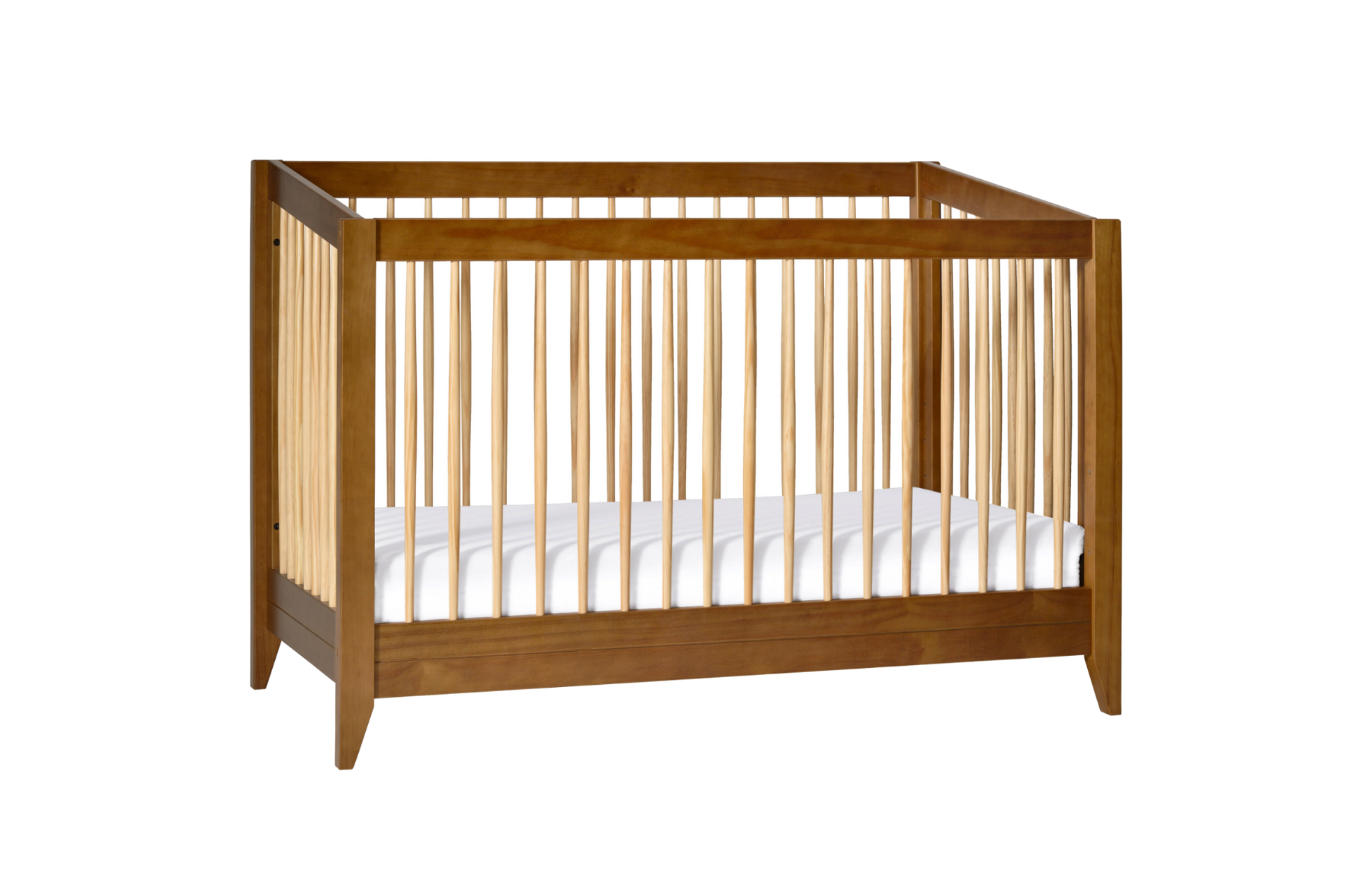 The Babyletto Sprout Convertible Crib features vertical slats on all sides and includes a white mattress, making it ideal for any nursery. Shown against a plain white background.