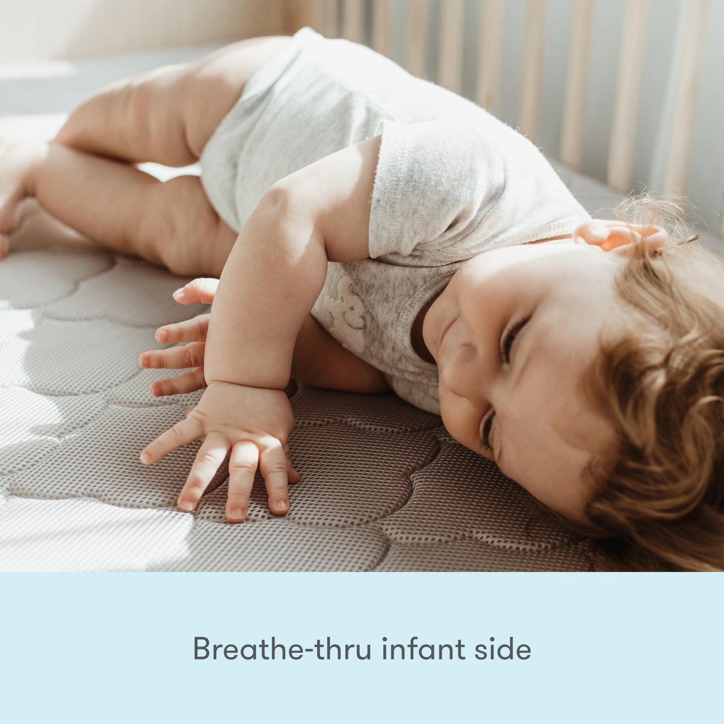 baby lying on grey waterproof newton mattress, with text "breathe-thru infant side"
