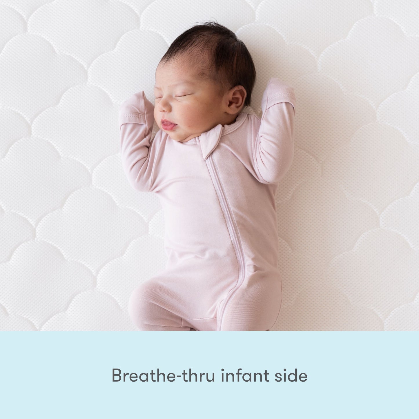 baby lying on White waterproof newton mattress, with text "breathe-thru infant side"