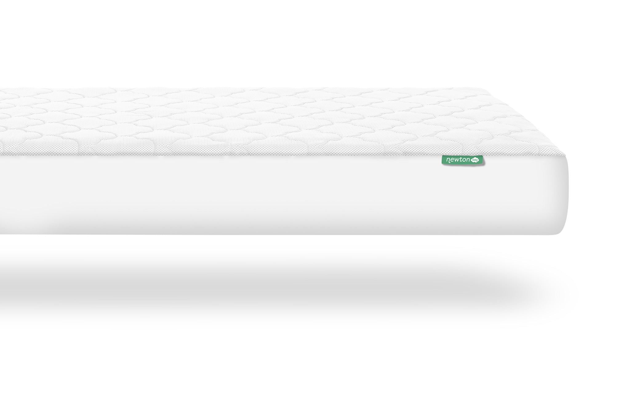 A Newton white mattress pad made from soft material, designed for comfort and protection.