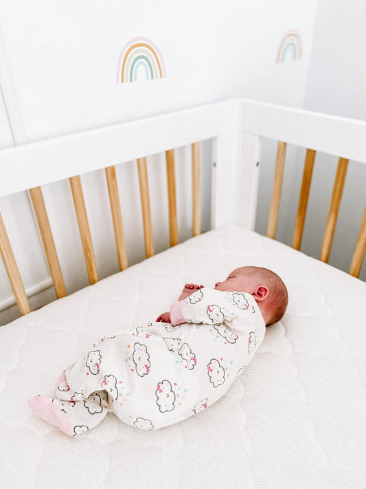 baby sleeping on side