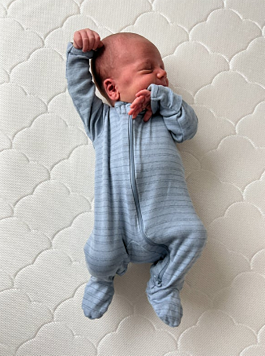 best sleeping position for baby with stuffy nose