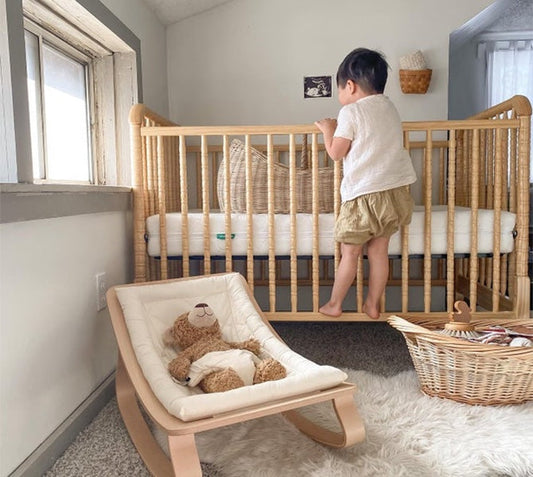 toddler crawling out of a crib during sleep regression