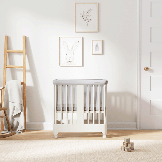 Gif of warm white color Newton Nest Convertible Crib in all of its different possible conversions, in a beautiful nursery 
999-8440-WRW-C1