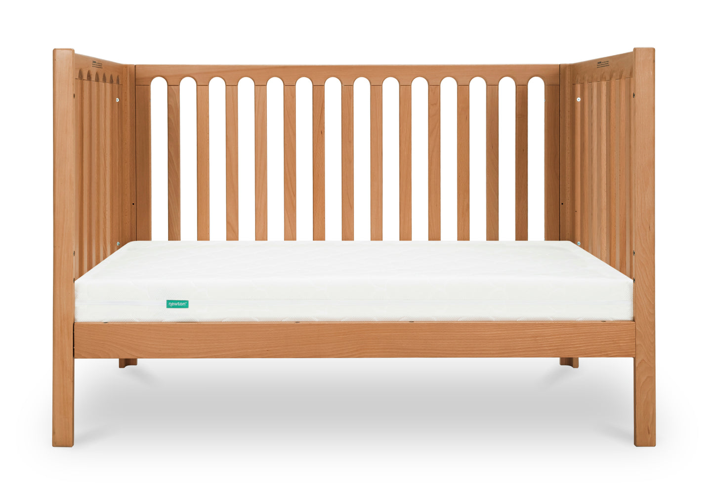 A wooden baby crib with a white Newton baby mattress.