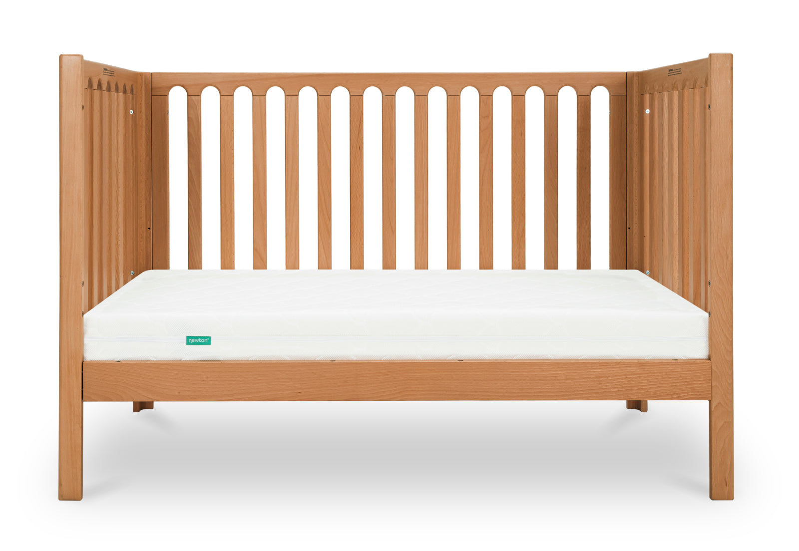 A wooden baby crib with a white Newton baby mattress.