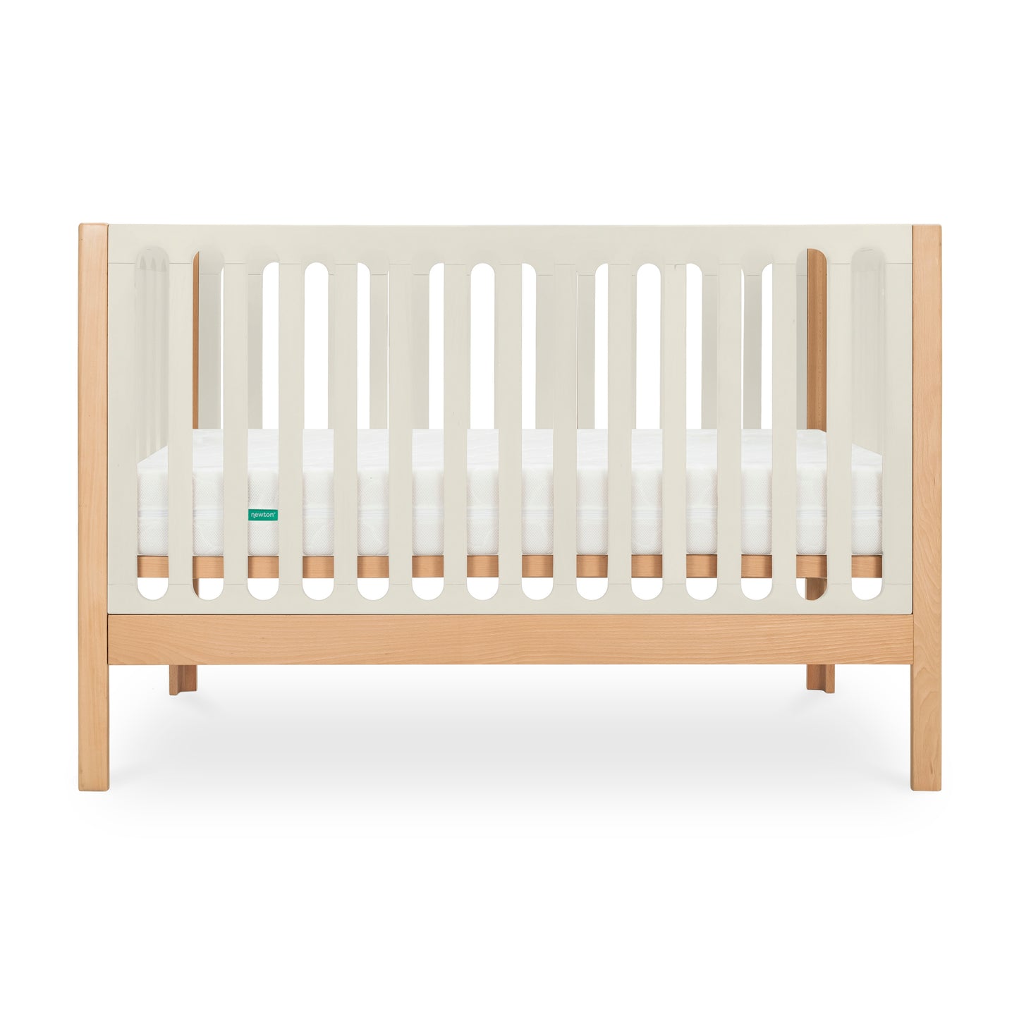The Newton Galileo Convertible Crib by Newton Baby features natural beech wood legs and frame, white slatted sides, a white mattress, and a minimalist design. It converts to a toddler bed for long-lasting versatility.