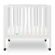 White modern baby crib with a thin mattress on wheels. 999-8430-WHT
