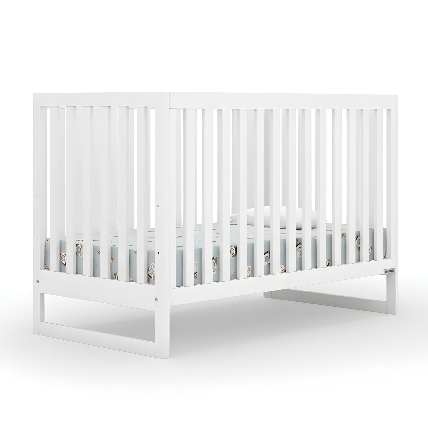 The Austin Convertible Crib by dadada baby is a white, sustainably crafted beechwood 3-in-1 crib with vertical slats and modern design, shown with a light blue Newton crib mattress against a plain white background. 500-8200-WHT