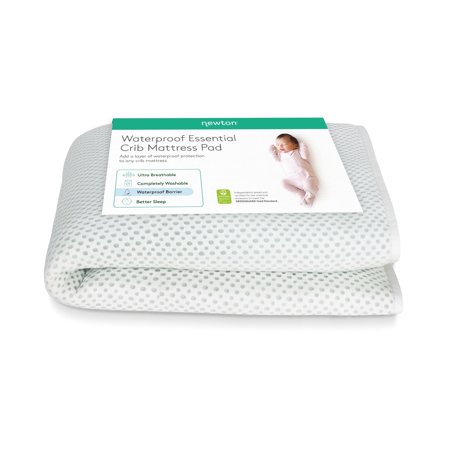 A folded Newton Baby Essential Waterproof Crib Pad with a breathable white and gray dotted design, shown with its product label and a picture of a sleeping baby.