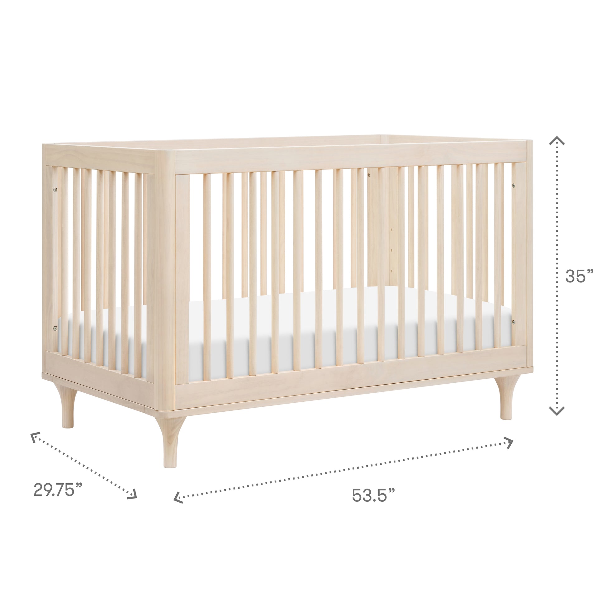 The Babyletto Lolly Convertible Crib features slatted sides and angled legs, made from New Zealand pine; measures 35" H x 53.5" W x 29.75" D. A white mattress fits perfectly inside.