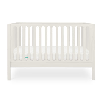 The Newton Galileo Convertible Crib by Newton Baby features modern white beech wood with vertical slats on all sides, a matching mattress, and converts to a toddler bed for extended use; shown against a plain white background.