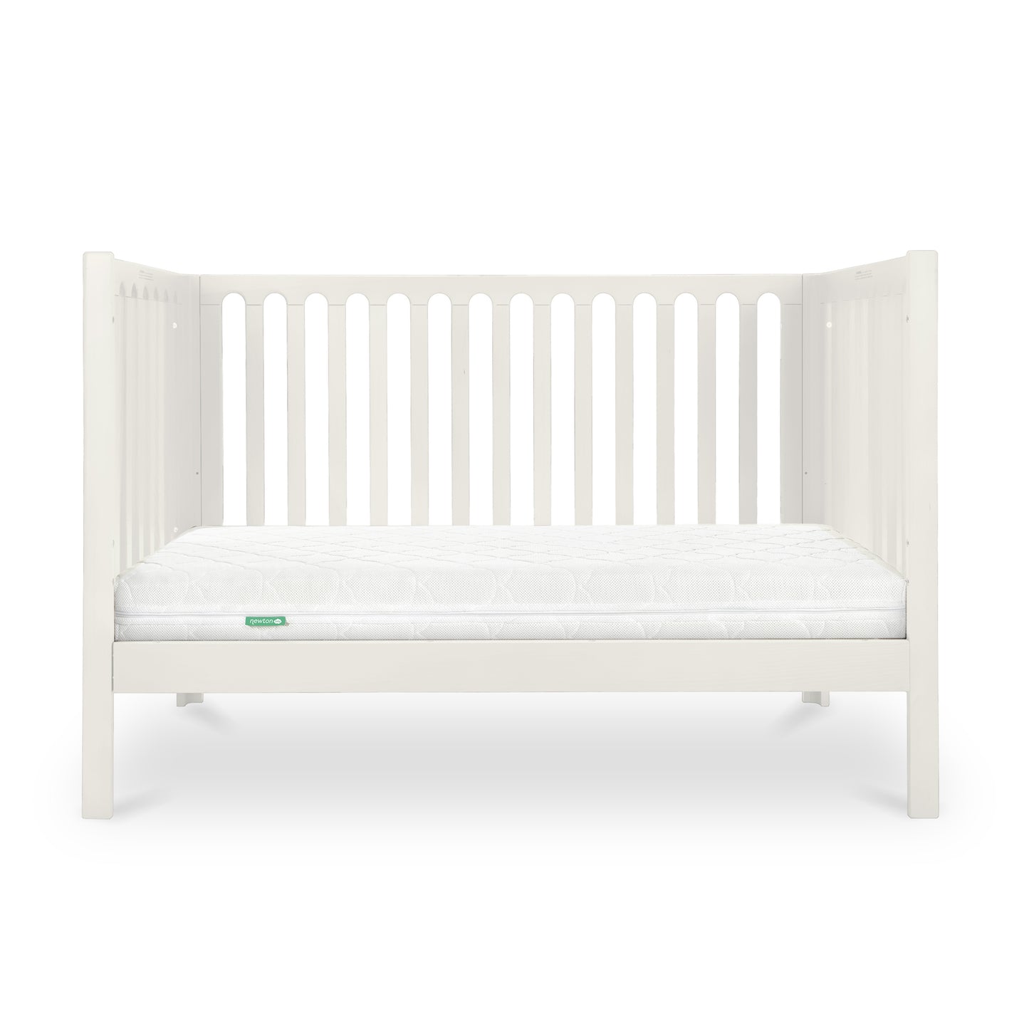 The Newton Galileo Convertible Crib by Newton Baby features white beech wood with vertical slats and a white mattress, set against a plain background. It easily converts from crib to toddler bed to suit your child’s needs.