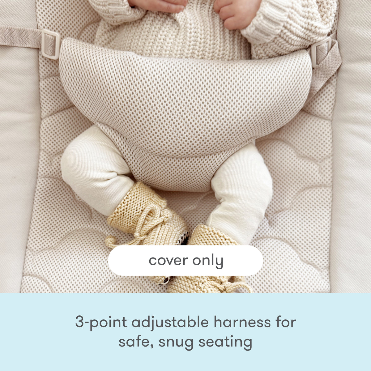 A baby wearing a knit sweater and booties sits in a beige seat with a 3-point adjustable harness. Text reads: Newton Baby’s Baby Rocker Extra Cover—cover only—featuring a breathable seat cover and 3-point adjustable harness for safe, snug seating.