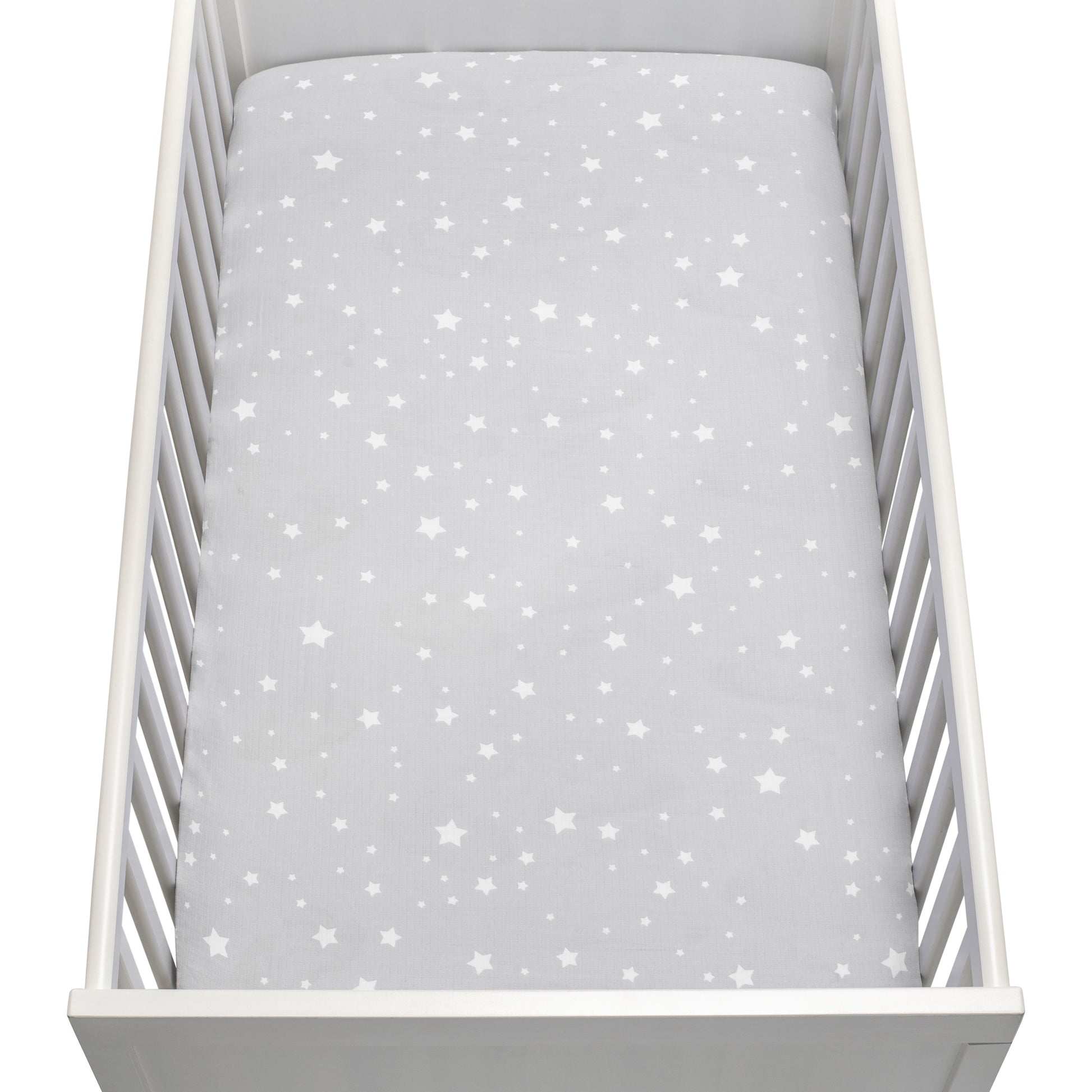 The Newton Baby Breathable, Organic Cotton Sheets (2-pack) include a light gray sheet with white stars in various sizes, made from soft, hypoallergenic fabric for your baby's comfort.