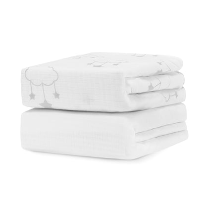Two Newton Baby Breathable, Organic Cotton Sheets (2-pack) are folded and stacked neatly, featuring a subtle grey cloud and star pattern, shown against a plain white background.