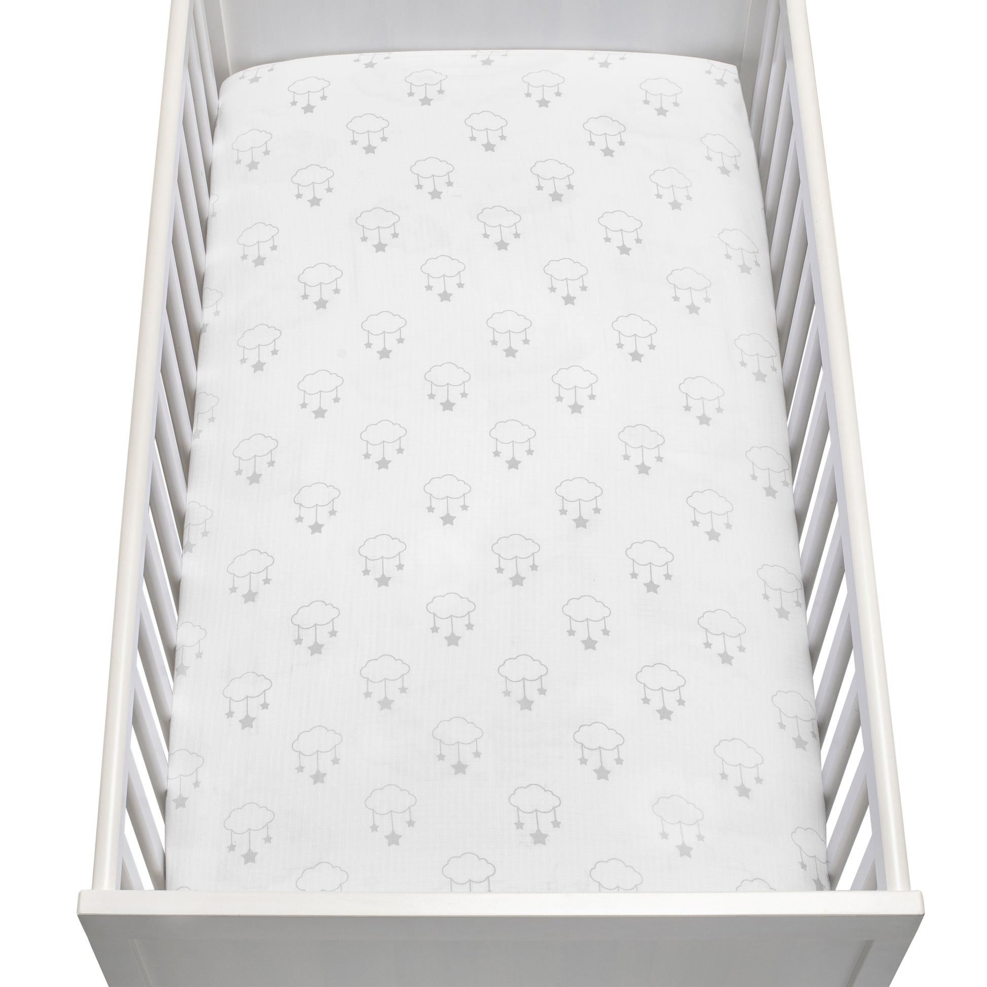 A white baby crib with vertical slats and a fitted sheet featuring a simple gray sheep pattern, viewed from above—made with Newton Baby's Breathable, Organic Cotton Sheets (2-pack) for a gentle and cozy sleep environment.