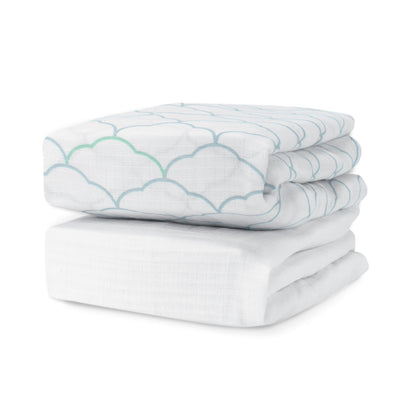 Stack of white and light blue patterned sheets on a white background. 999-3020-DWW