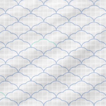 A seamless pattern of blue scallops on a white grid, accented with light green, creates calm geometry—ideal for Newton Baby’s Breathable, Organic Cotton Sheets (2-pack).