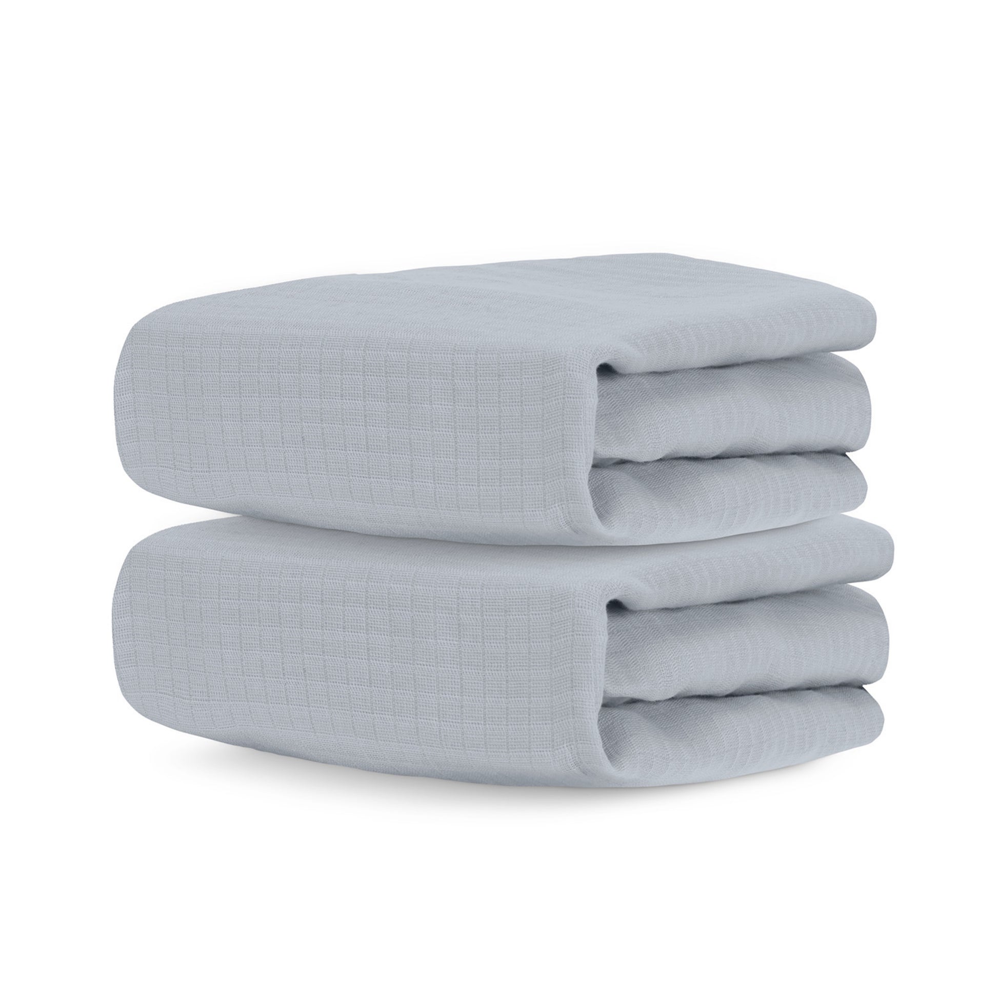 Two neatly folded, light gray Newton Baby Breathable, Organic Cotton Sheets (2-pack) with a subtle textured grid pattern—ideal for layering in the crib.