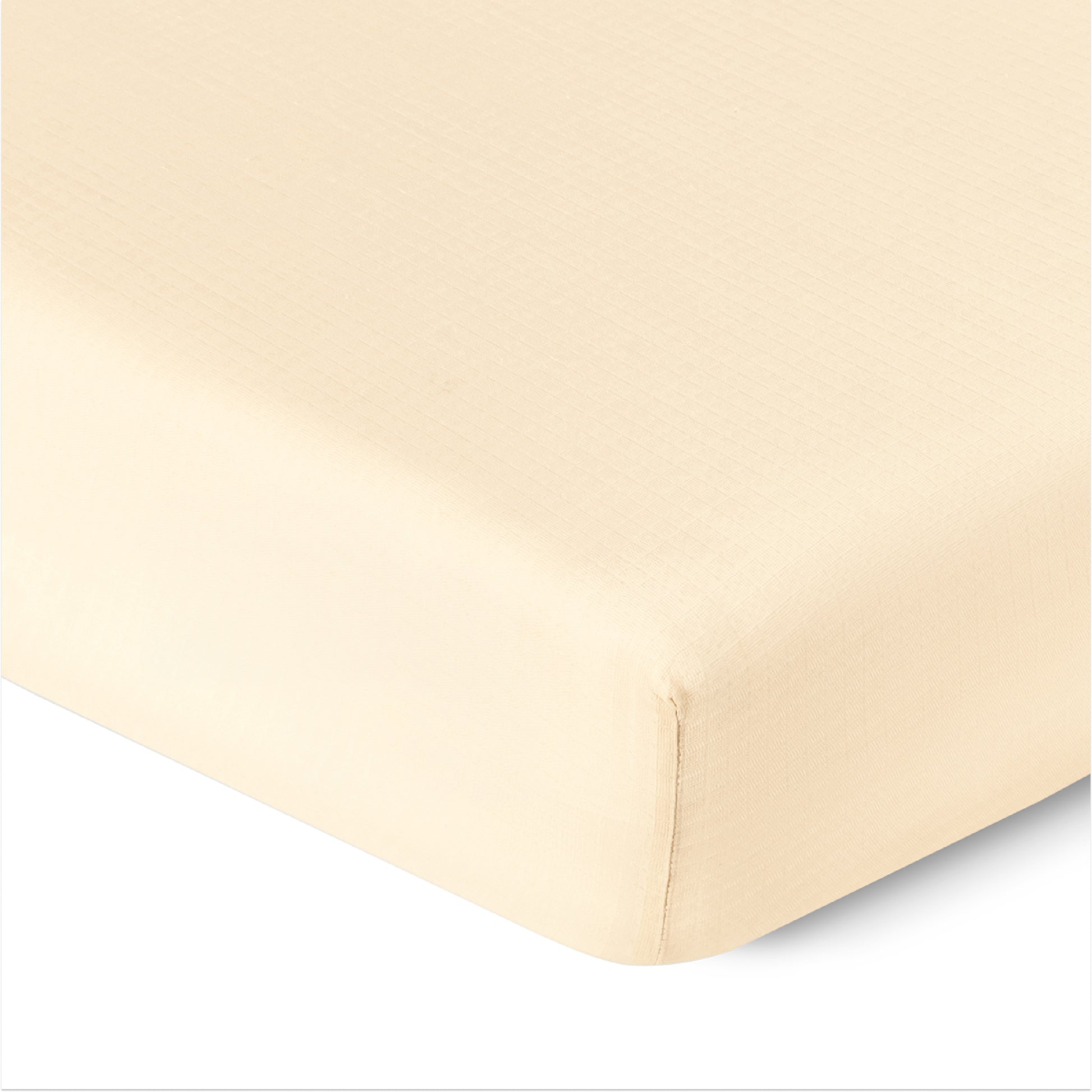 Close-up of a corner of Newton Baby Breathable, Organic Cotton Sheets (2-pack) on a mattress, showing the smooth, tightly-fitted fabric and clean edges.