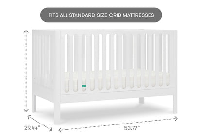 White crib labeled "FITS ALL STANDARD SIZE CRIB MATTRESSES" with dimensions 29.44” in height and 53.77” in length displayed.
