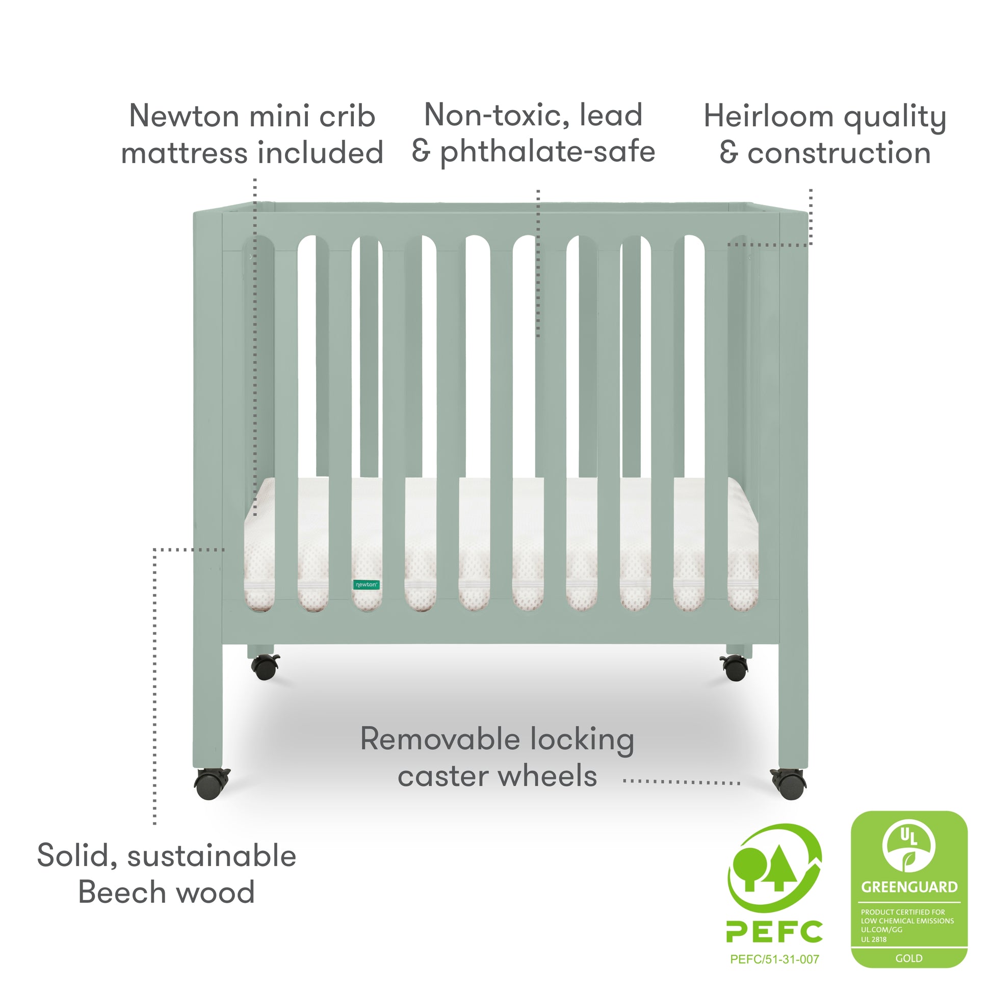 The Newton Galileo Mini Crib with Newton Mattress by Newton Baby is a pale green, solid beech wood crib with vertical slats, locking caster wheels for portability, and a white mattress. Made from non-toxic materials; PEFC and GREENGUARD certified.