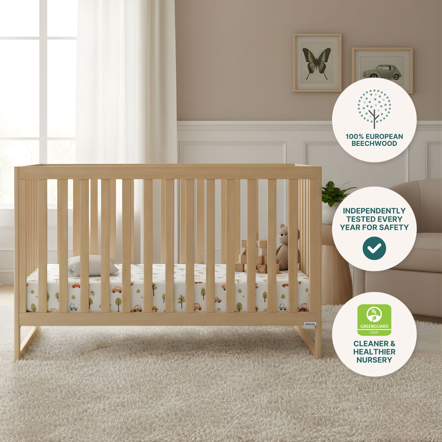 The Austin Convertible Crib by dadada baby, paired with a patterned mattress, is featured in a softly lit nursery. Icons show it’s made from sustainable beechwood, safety tested annually, and GREENGUARD certified for healthier air.