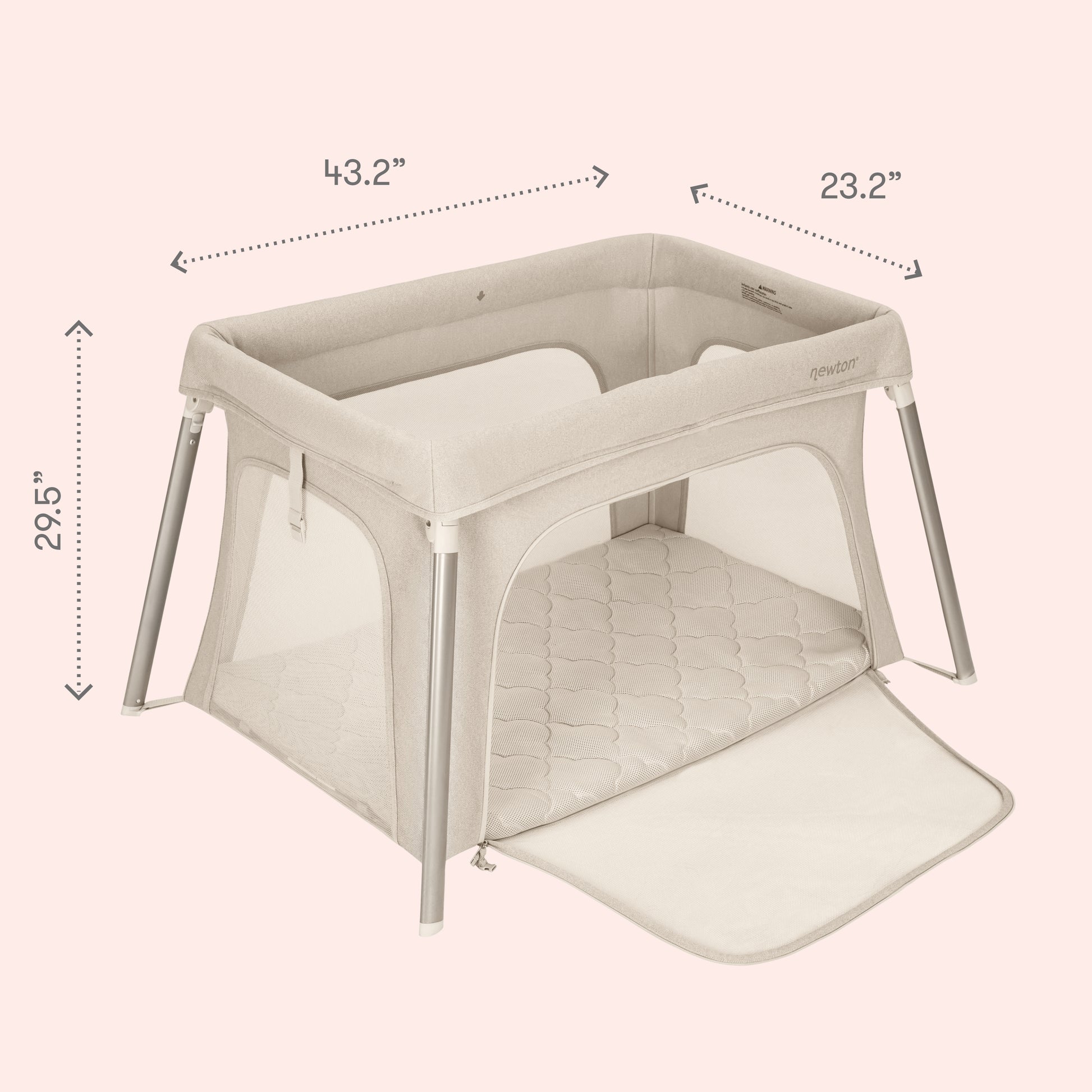 The Newton Baby Compact Travel Crib & Play Yard is a beige playpen with mesh sides, metal legs, a zippered side opening, and a washable mattress. Dimensions: 43.2"W x 23.2"D x 29.5"H.