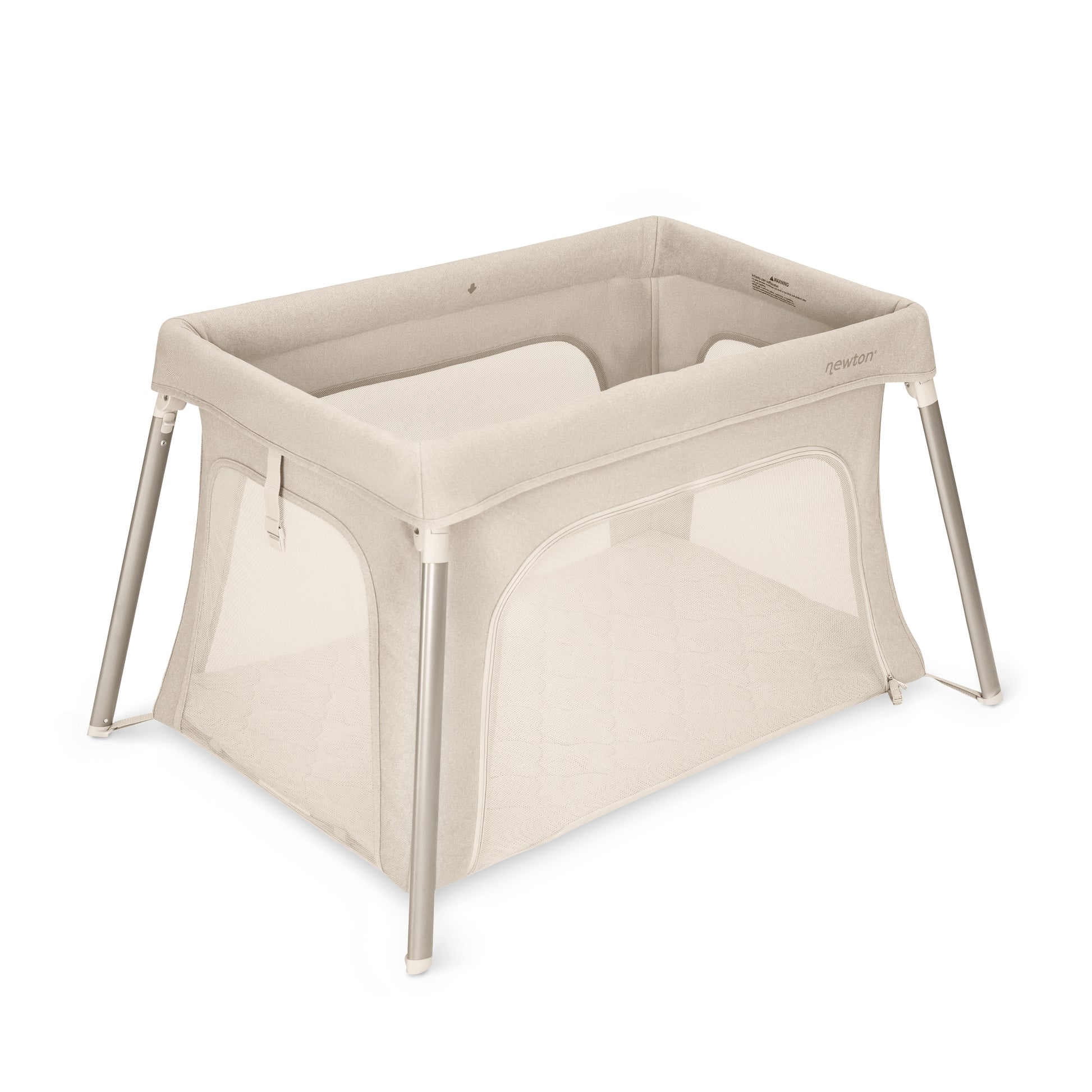 The Newton Baby Compact Travel Crib & Play Yard is a beige, rectangular crib with mesh sides, a washable mattress, and sturdy silver legs, shown on a white background.