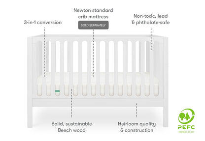 White 3-in-1 convertible crib made of solid, sustainable beech wood, featuring heirloom quality construction and compatibility with Newton standard crib mattress, labeled non-toxic, lead & phthalate-safe, and PEFC certified.