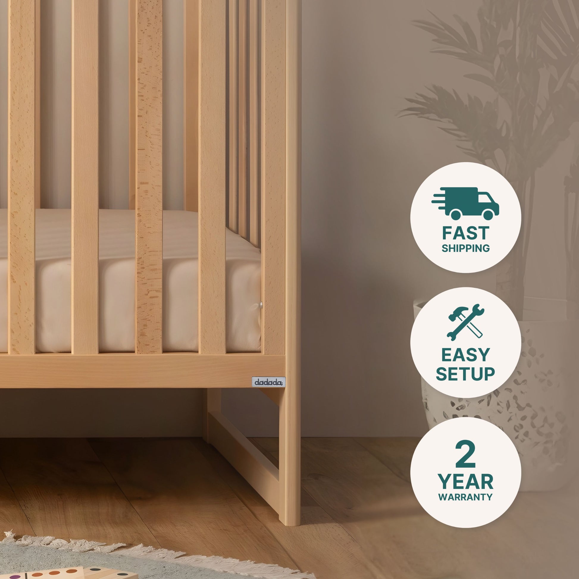 The dadada baby Austin Convertible Crib, crafted from sustainable beechwood, features a 3-in-1 design and comes with a white mattress. On the wooden floor, icons highlight fast shipping, easy setup, and a 2-year warranty.